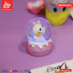 ⁦Ceramic Snow Ball - Daisy Duck⁩ - الصورة ⁦2⁩