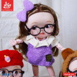 ⁦1Pc Random-Hard Rubber Doll With Music - Stylish Outfit 27Cm⁩ - الصورة ⁦3⁩