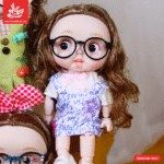 ⁦1Pc Random - Hard Rubber Doll With Music - Beautiful Clothing 27Cm⁩ - الصورة ⁦6⁩