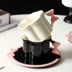 ⁦Set Of 2pcs Ceramic Mug Bow Cute with Saucer - White 280ml⁩ - الصورة ⁦8⁩
