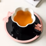 ⁦Set Of 2pcs Ceramic Mug Bow Cute with Saucer - Black 280ml⁩ - الصورة ⁦2⁩