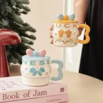 ⁦1Pc Random - 3D Pastel Ceramic Mug With Bow Lid - 400ml⁩ - الصورة ⁦4⁩