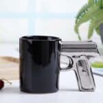⁦1Pc Random - 3D Ceramic Gun Mug 320 ml⁩ - الصورة ⁦3⁩